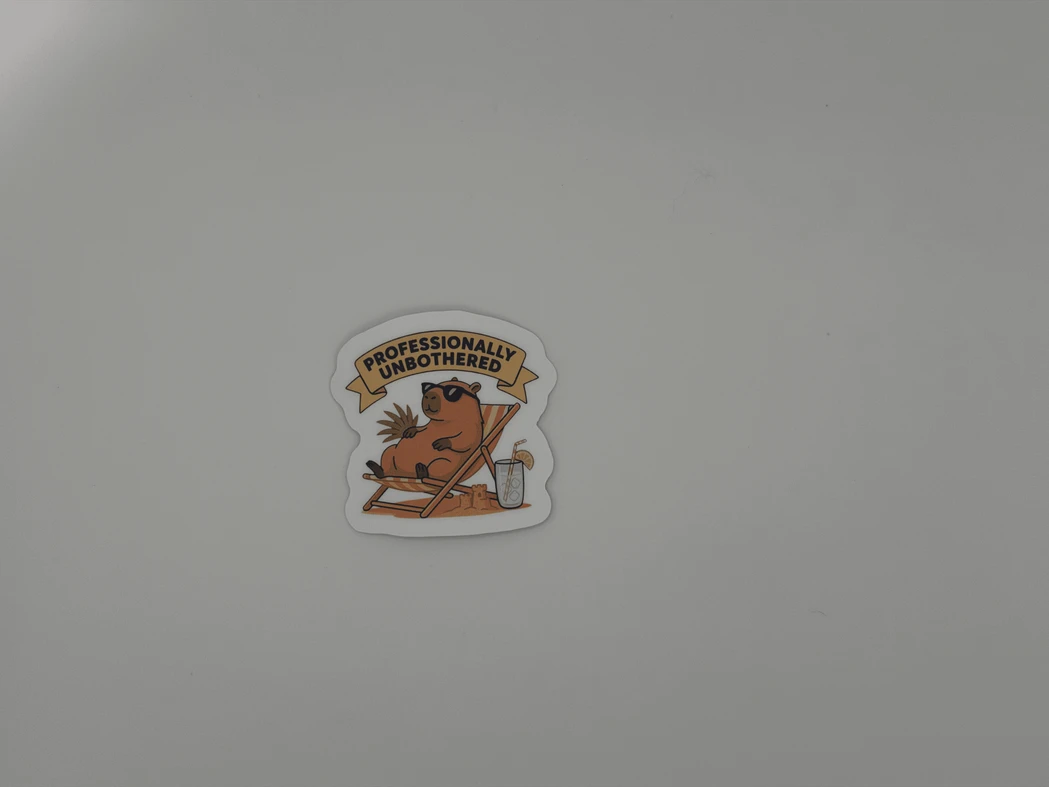 Professionally Unbothered Capybara Sticker